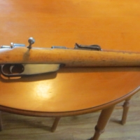 After: 100 year old Italian service rifle.<br />
Serious finish damage due to water, ink and years of abuse.<br />
