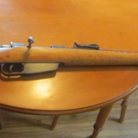 After: 100 year old Italian service rifle.<br />
Serious finish damage due to water, ink and years of abuse.<br />
